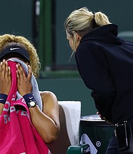 Naomi Osaka is seen speaking with WTA supervisor Clare Wood after play was disrupted by a shout from the crowd during the BNP Paribas Open on March 12 in Indian Wells, California.
Mandatory Credit:	Clive Brunskill/Getty Images