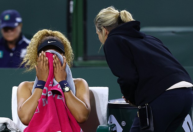 Naomi Osaka is seen speaking with WTA supervisor Clare Wood after play was disrupted by a shout from the crowd during the BNP Paribas Open on March 12 in Indian Wells, California.
Mandatory Credit:	Clive Brunskill/Getty Images