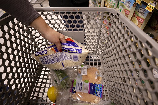 An Instacart shoppers places items in a cart at a ShopRite on January 08, 2022 in Clark, New Jersey.
Mandatory Credit:	Michael Loccisano/Getty Images North America/Getty Images