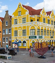 The Penha Building was built in 1708 in the Dutch colonial style and is now a department store in Willemstad, the capital of the island.
Mandatory Credit:	Jon G. Fuller/VWPics/AP