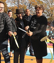 Officials cut the ribbon last November to formally open new basketball courts in the Hillside Court public housing community.