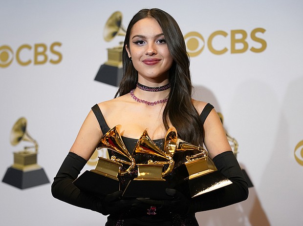 Olivia Rodrigo poses in the press room at the 64th Annual Grammy Awards on Sunday, April 3, in Las Vegas. Rodrigo accidentally broke one of her Grammy Awards.
Mandatory Credit:	John Locher/Invision/AP