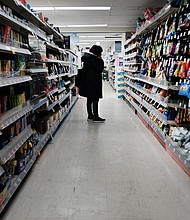 People shop in a store in Brooklyn on March 10, 2022 in New York City. The Federal Reserve's fight against inflation will spark a recession in the United States that begins late next year, Deutsche Bank warned on April 5.
Mandatory Credit:	Spencer Platt/Getty Images