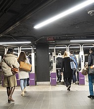 Commuters are seen here at the Grand Central subway station in New York on March 28. More workers are returning to the office after working from home for the last two years.
Mandatory Credit:	Eilon Paz/Bloomberg/Getty Images