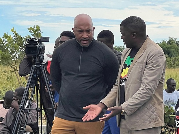 Dr. Michael Jones, left, and Apostle Sunday Sinyangwe, founder of the Chibombo branch of Shalom Embassy Ministries International, converse in Chibombo, Zambia, during Dr. Jones’ mission trip to the East African nation in late March.