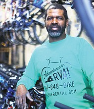 Elvin Jefferson, owner of Adventures in RVA in Shockoe Bottom, shows the rows and rows of bikes available for rent by day trippers and serious enthusiasts.