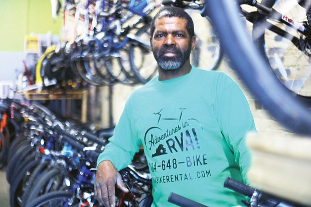 Elvin Jefferson, owner of Adventures in RVA in Shockoe Bottom, shows the rows and rows of bikes available for rent by day trippers and serious enthusiasts.