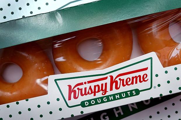Every Wednesday through May 4, Krispy Kreme is selling a dozen original glazed doughnuts at the price of gas.
Mandatory Credit:	Scott Olson/Getty Images