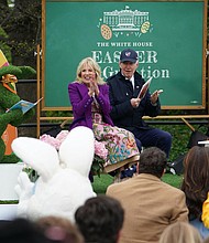 President Joe Biden and First Lady Jill Biden read a book to children during the annual Easter Egg Roll on the South Lawn of the White House in Washington, DC on April 18.
Mandatory Credit:	Mandel Ngan/AFP/Getty Images