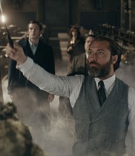 Left to right - Jessica Williams, Callum Turner, Fiona Glascott, Dan Fogler, Jude Law and Eddie Redmayne star in "Fantastic Beasts: The Secrets of Dumbledore."
Mandatory Credit:	Courtesy of Warner Bros. Picture