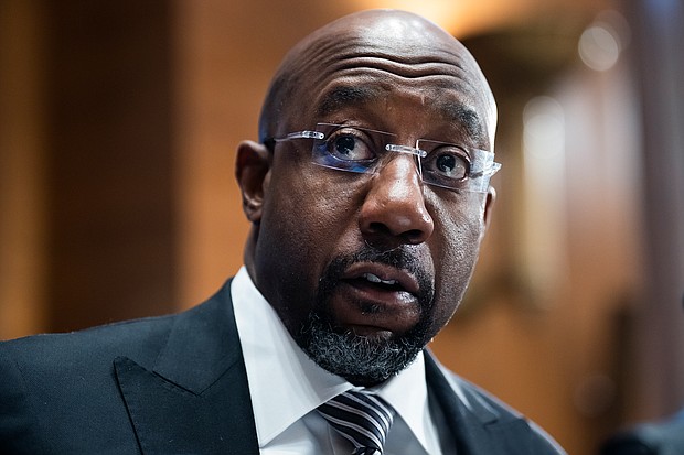 Georgia Sen. Raphael Warnock is seen at a hearing on Capitol Hill in Washington, DC, on March 3.
Mandatory Credit:	Tom Williams/Pool/Getty Images