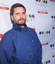As the father of Kourtney's three children, Scott Disick has been a part of the family even though the two split in 2015 after dating off and on for almost a decade. Disick is shown here at the Sugar Factory American Brassiere on October 13, 2017 in Bellevue, Washington.
Mandatory Credit:	Mat Hayward/Getty Images for Sugar Factory American Brasserie