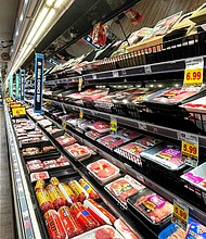 A person shops in the meat section of a grocery store on November 11, 2021 in Los Angeles, California. Consumers around the world are paying more for goods and services.
Mandatory Credit:	Mario Tama/Getty Images