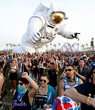 Concertgoers dance around a large-scale moving sculpture called "Escape Velocity" at Coachella in 2014. The festival will be streaming online courtesy of Coachella's channel on YouTube.
Mandatory Credit:	Mario Anzuoni/Reuters