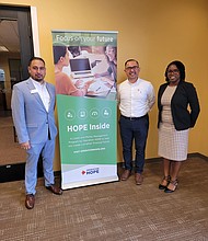 Photo: (Left to Right) Branch Manager Franklin Luna, Operation HOPE Coach Luis Jaramillo Chan, and District Manager Tanya McCarter at the Port City Branch HOPE center.