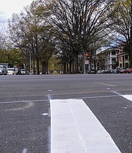 Just another section of road in Richmond. That’s what this intersection at Monument Avenue and Arthur Ashe Boulevard now looks like. Hard to believe that for more than 100 years, this intersection was dominated by a statue of slavery-defending Confederate Gen. Thomas J. “Stonewall” Jackson riding a horse. The statue was removed in July 2020. Earlier this year, the pedestal and other statue supports were replaced with paving. Other former Confederate statue sites along Monument Avenue now are planted with flowers and plants, a big change for a city that is seeking to be known as far more than “the former capital of the Confederacy.” Still, tributes to the Confederacy still linger in Richmond. There are street names and bridge names that Richmond City Council in Richmond has balked at changing, including the centerpiece Robert E. Lee Bridge. A statue to Confederate Gen. A.P. Hill still stands in North Side, as does a marker to Richmond Confederate units that sits on the lawn of the Marsh courthouse in South Side. The courthouse is named for two Black legal icons, Henry L. Marsh III and his late brother, Harold M. Marsh Sr.