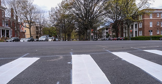 Just another section of road in Richmond. That’s what this intersection at Monument Avenue and Arthur Ashe Boulevard now looks like. Hard to believe that for more than 100 years, this intersection was dominated by a statue of slavery-defending Confederate Gen. Thomas J. “Stonewall” Jackson riding a horse. The statue was removed in July 2020. Earlier this year, the pedestal and other statue supports were replaced with paving. Other former Confederate statue sites along Monument Avenue now are planted with flowers and plants, a big change for a city that is seeking to be known as far more than “the former capital of the Confederacy.” Still, tributes to the Confederacy still linger in Richmond. There are street names and bridge names that Richmond City Council in Richmond has balked at changing, including the centerpiece Robert E. Lee Bridge. A statue to Confederate Gen. A.P. Hill still stands in North Side, as does a marker to Richmond Confederate units that sits on the lawn of the Marsh courthouse in South Side. The courthouse is named for two Black legal icons, Henry L. Marsh III and his late brother, Harold M. Marsh Sr.