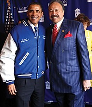 Dr. Harvey poses for a photo with President Barack Obama, who delivered the commencement address on Sunday, May 9, 2010, at Hampton University’s Armstrong Stadium to thousands of cheering students and their families. Here, President Obama wears a specialty jacket in Hampton University’s colors that was embroidered with his name and that of the university.