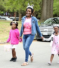 Ruby Tate of Henrico County, center, arrived early with her niece, Lyric Harris, 6, left, and her daughters, Mya Tate, 5, front right, and Lauren Tate, 8, and spent a few hours at the celebration before heading home.