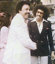 Dr. Harvey greets singer Lionel Richie at Hampton University. While the date of this photo is uncertain, Mr. Richie flew to campus from Los Angeles at his own expense, he said at the time, to emcee Hampton University’s 125th anniversary celebration on April 1, 1993. He told a local newspaper that he and Dr. Harvey had a long-standing friendship dating back to their days at Tuskegee Institute when Mr. Richie was a student and Dr. Harvey was an administrator.