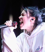 Billie Eilish, performing here at Coachella on April 13, headlined both weekends of the festival with Harry Styles.
Mandatory Credit:	Frazer Harrison/Getty Images