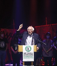 Sen. Bernie Sanders of Vermont, who was joined on stage by local Starbucks workers, speaks at Unity Fest last Sunday at the National Theater in Downtown to celebrate their successful efforts to unionize.