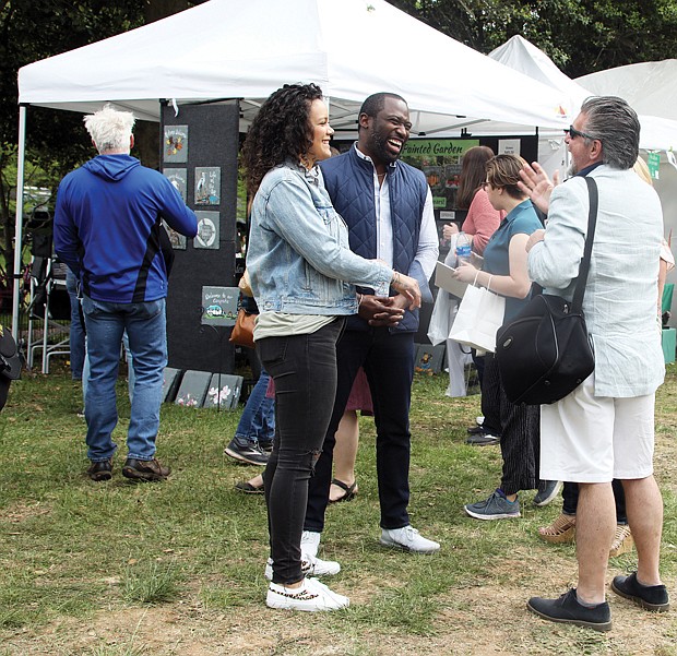 Spotted among the throngs of people are Richmond Mayor Levar M. Stoney and his fiancée, Brandy Washington, who paused to talk and laugh with James Mercante, the assistant director for public affairs with the Richmond Police Department.
