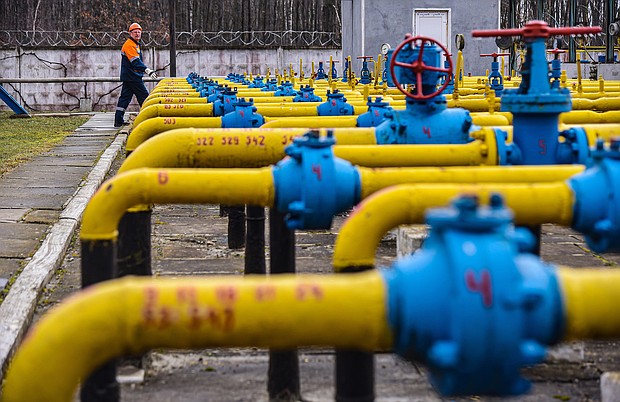 Gas station worker walks near gas pipes at a natural gas station during the installation of complex gas preparation at the Ukrgasvydobuvannya UCPG facility.
Mandatory Credit:	Mykola Tys/SOPA Images/LightRocket/Getty Images