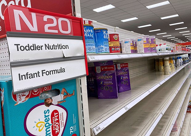A baby formula display sits nearly empty at a Target store in Orlando.
Mandatory Credit:	Paul Hennessy/SOPA Images/Sipa USA/AP