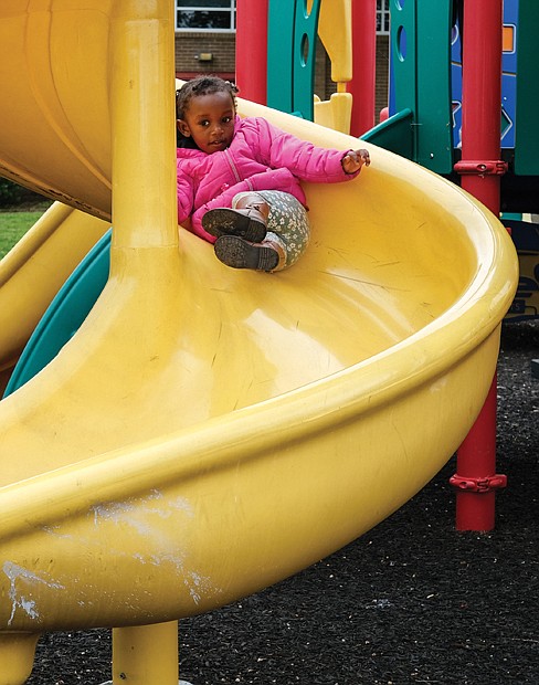 Jaliyah Blue, 2, takes a ride on a slide at the annual Strawberry Street Festival held last Saturday at Clark Springs Elementary School in Randolph. The event typically takes place at William Fox School in The Fan. But the school sustained major damage in a fire in February, and the students were moved earlier this week to Clark Springs. The festival benefits the Fox Elementary PTA and featured carnival games, a raffle, food trucks, music and strawberries.