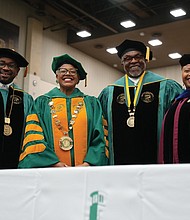 Norfolk State University commencement speaker and actor Keith David, second from right, is all smiles after receiving the Presidential Medallion during the ceremony last Saturday. With him are, from left, NSU Rector and 2000 NSU graduate Devon M. Henry, chief executive officer and president of Team Henry Enterprises, the contracting firm that removed the Confederate statues from Richmond’s Monument Avenue; NSU President Javaune Adams-Gaston and Provost DoVeanna Fulton.