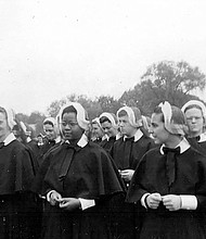 This 1956 photo shows Sister Cora Marie Billings, now of Richmond, center, who was 17 at the time and became the first Black nun admitted into the Sisters of Mercy in Philadelphia. Later, she was the first Black nun to teach in a Catholic high school in Philadelphia and was a co-founder of the National Black Sisters’ Conference in the 1960s.