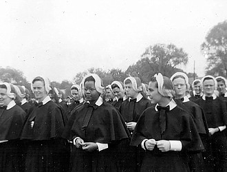 This 1956 photo shows Sister Cora Marie Billings, now of Richmond, center, who was 17 at the time and became the first Black nun admitted into the Sisters of Mercy in Philadelphia. Later, she was the first Black nun to teach in a Catholic high school in Philadelphia and was a co-founder of the National Black Sisters’ Conference in the 1960s.