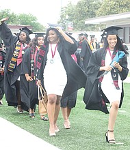 Members of the graduating class march into the stadium at the start of last Saturday’s 123rd Commencement exercises. It was the first in-person commencement at VUU since 2019, and graduates of the classes of 2020 and 2021 also marched.