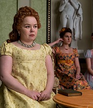 The "Bridgerton" TV series will diverge from the series of romance novels by Julia Quinn on which it is based and will tell the love story of Penelope Featherington (Nicola Coughlan) and Colin Bridgerton (Luke Newton) in the third season.
Mandatory Credit:	Liam Daniel/Netflix