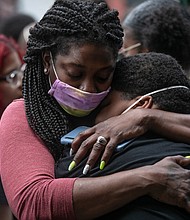 Friends and family mourn the death of Conrad Coleman Jr. following his funeral service on July 3, 2020 in New Rochelle, New York. More than one million Americans have now died of Covid-19 since the pandemic's start, according to Tuesday data from Johns Hopkins University.
Mandatory Credit:	John Moore/Getty Images)