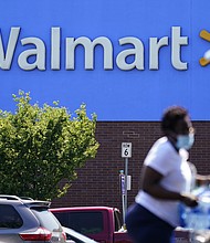 Walmart said on May 17 that higher costs and supply chain constraints squeezed its profit during its latest quarter. Walmart also slashed its profit outlook for the year, signaling that it expects inflation to continue to hurt its business.
Mandatory Credit:	Matt Rourke/AP