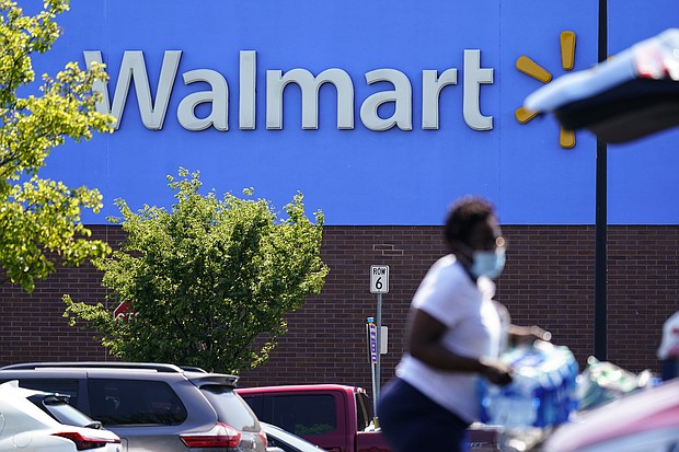Walmart said on May 17 that higher costs and supply chain constraints squeezed its profit during its latest quarter. Walmart also slashed its profit outlook for the year, signaling that it expects inflation to continue to hurt its business.
Mandatory Credit:	Matt Rourke/AP