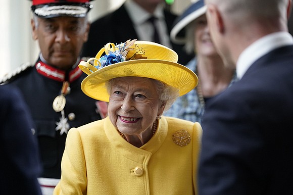 Britain's Queen Elizabeth II made a surprise public appearance at the opening of a long-awaited train line in London on …