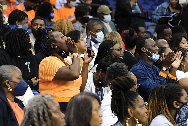 Proud family and friends of graduates express excitement during the Virginia State University spring commencement ceremony at the VSU Multi-Purpose Center last Saturday.