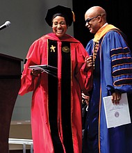 Keynote speaker Dr. Khaalida Forbes and VSU President Makola M. Abdullah, Ph.D. share a laugh during Virginia State University’s commencement.