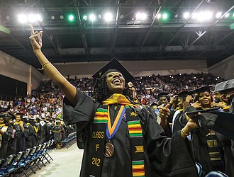 Sarah Peebles is ecstatic after the hooding ceremony during VSU’s spring commencement last Saturday at VSU’s Multi-Purpose Center.