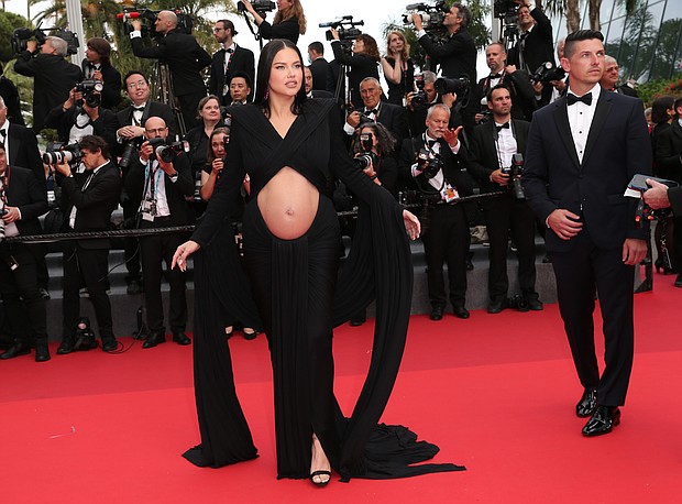 Former Victoria's Secret model Adriana Lima, is pictured at the screening of "Top Gun: Maverick," showing her baby bump in a custom-made Balmain look.
Mandatory Credit:	Gisela Schober/German Select/Getty