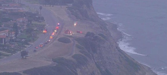 One person is dead and three others injured Monday after falling down a cliff in the Palos Verdes Estates area.