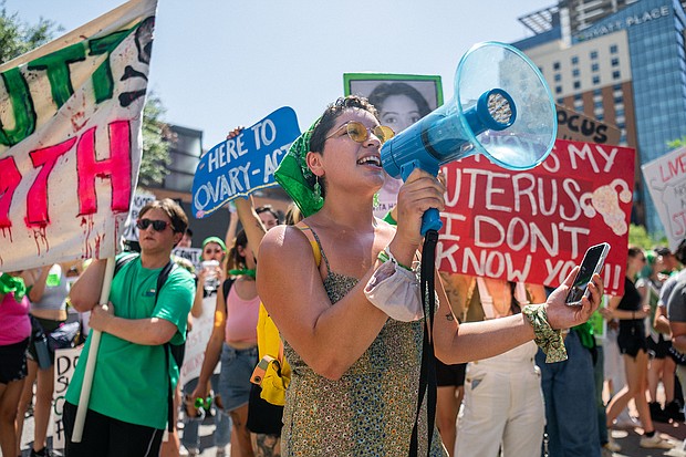 Abortion rights activists and supporters march outside of the Austin Convention Center where the American Freedom Tour with former President Donald Trump is being held on May 14, in Austin, Texas.
Mandatory Credit:	Brandon Bell/Getty Images