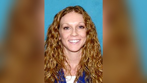 Authorities are searching for a Texas woman accused of murdering an elite cyclist who at one time dated her boyfriend.