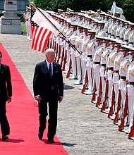 President Joe Biden and Japan's Prime Minister Fumio Kishida pictured here in Tokyo on May 23, as President Biden says the thirteen nations joining his long-sought economic plan for Asia were "signing up to work toward an economic vision that will deliver for all people on Earth."
Mandatory Credit: The Yomiuri Shimbun/AP
