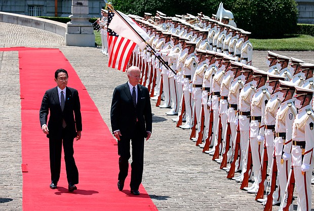 President Joe Biden and Japan's Prime Minister Fumio Kishida pictured here in Tokyo on May 23, as President Biden says the thirteen nations joining his long-sought economic plan for Asia were "signing up to work toward an economic vision that will deliver for all people on Earth."
Mandatory Credit:	The Yomiuri Shimbun/AP