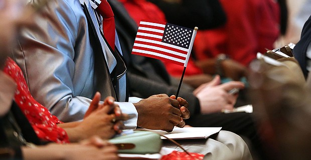 Candidates for U.S. citizenship wait to be administered the Oath of Allegiance by U.S. Supreme Court Justice Ruth Bader Ginsburg for U.S. citizenship on April 10, 2018 in New York City.
Mandatory Credit:	Spencer Platt/Getty Images