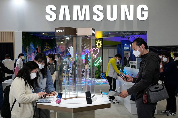 Samsung outlined a plan to pour more than $350 billion into its businesses and create tens of thousands of new jobs over the next five years.
Mandatory Credit: Ahn Young-joon/AP